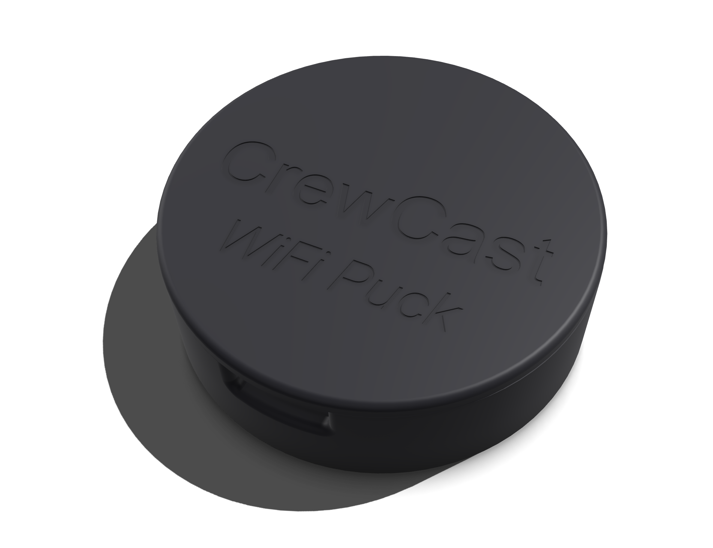 The CrewCast WiFi puck, a small round black box